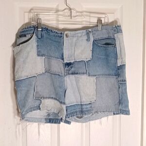 Revolt denim patchwork distressed shorts